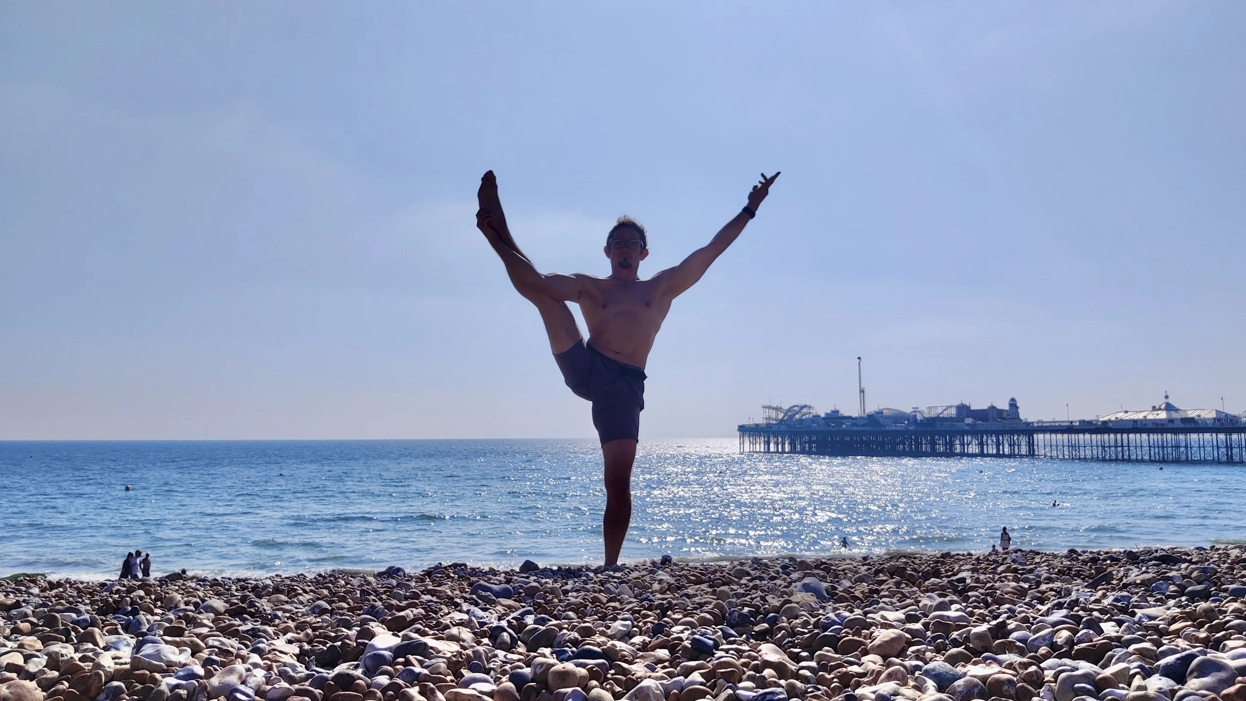 Kester Hynds — handstand on a standing stone
